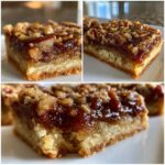 Close-up of a thick, gooey pecan pie bars square showing the shortbread crust and rich pecan topping.